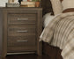 Juararo Queen Poster Bed with Mirrored Dresser, Chest and Nightstand